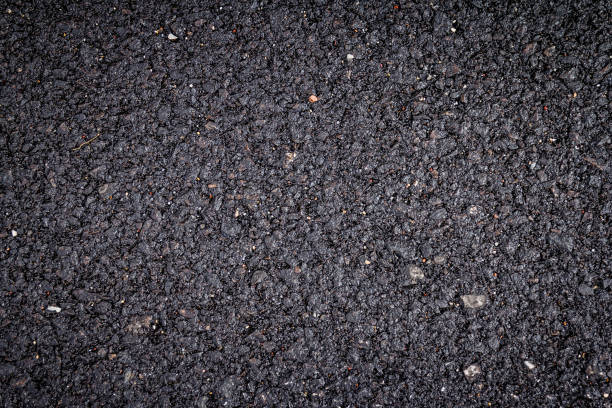 istock close up of new asphalt road texture 1209893989