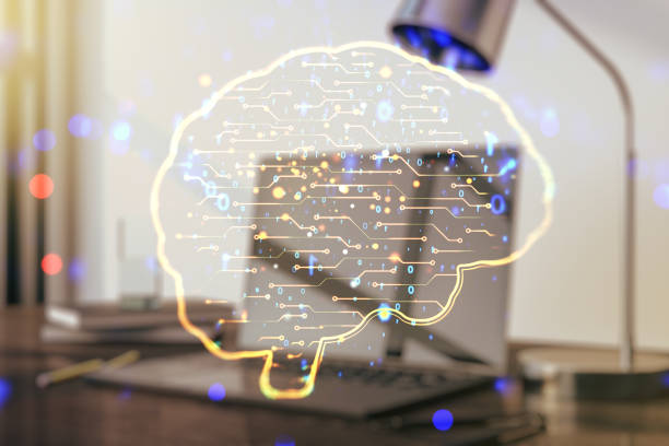 istock Creative artificial Intelligence concept with human brain hologram on modern laptop background. Multiexposure 1209894931