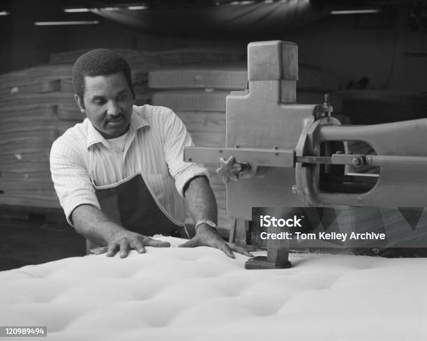 Man Manufacturing Duvet In Factory Stock Photo - Download Image Now - Black And White, Manufacturing, Duvet