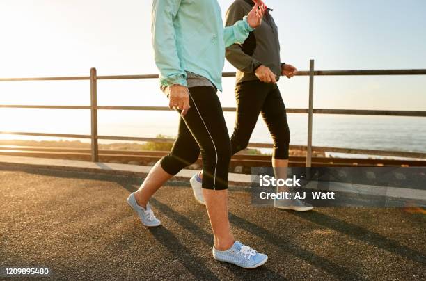Walking Keeps You Healthy Stock Photo - Download Image Now - Walking, Exercising, Women