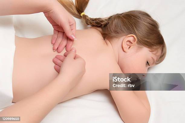 Woman Does Massage To Little Girl Stock Photo - Download Image Now - Massaging, Child, Girls