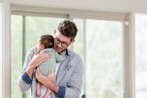 istock New dad spending quality time with baby 1209896612