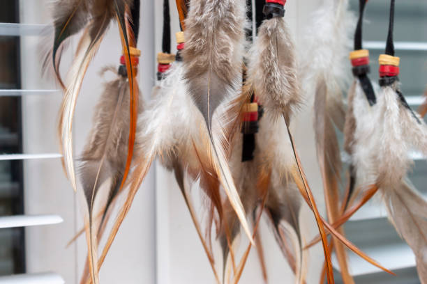 istock Dream catcher feathers boho chic, ethnic amulet,symbol hanging on a window 1209896704