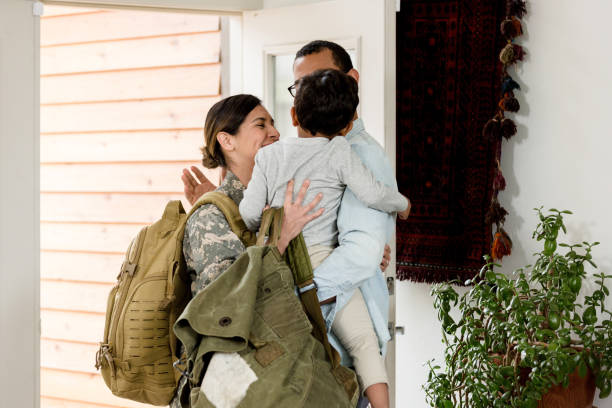 istock Family happy to see each other after mother's deployment 1209896852