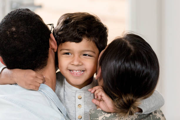 istock Boy is happy to have both parents together for hug 1209896861