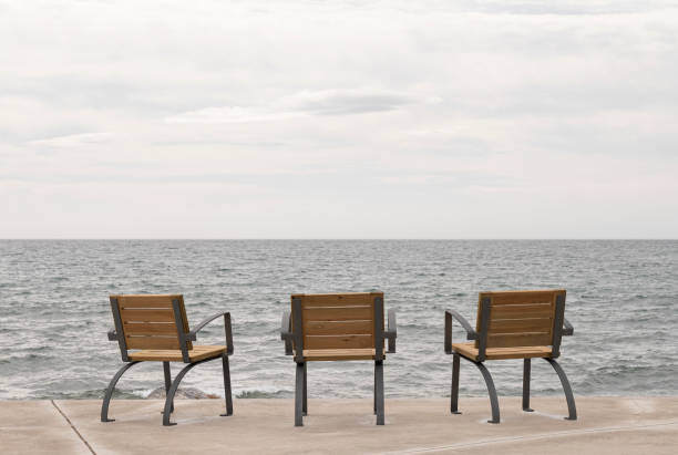 istock chairs on the promenade with sea views 1209900138