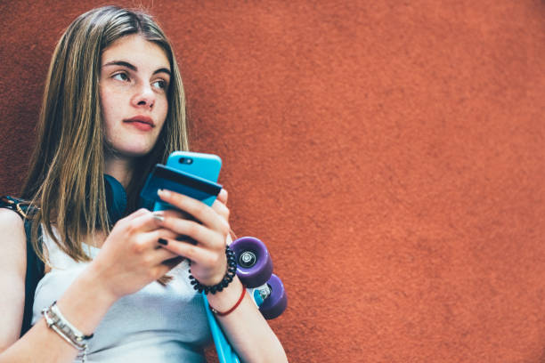 istock Girl using credit card for online shopping 1209902497