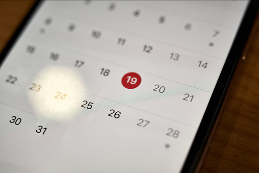 Close-up of smartphone with calendar