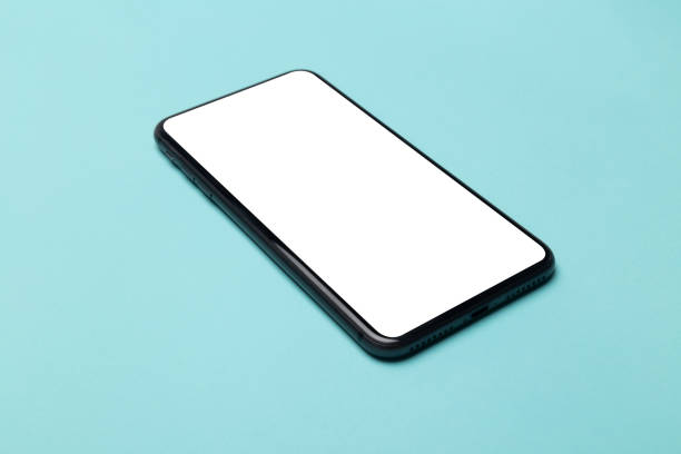 istock Black smartphone with blank screen mockup isolated on blue background. Clipping path 1209903351