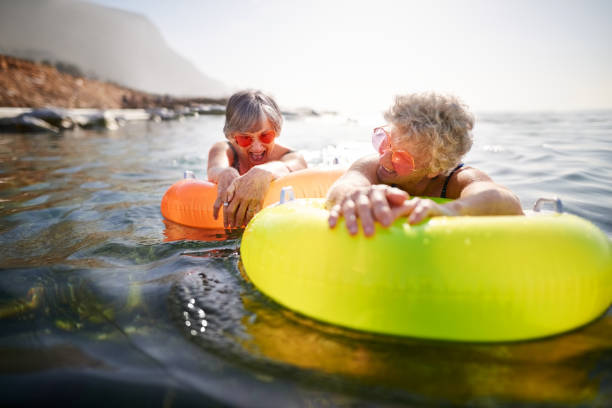 istock Vacationer having fun in the sea 1209904971