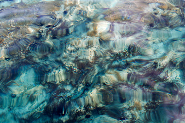 istock Blurred sea bottom and transparent sea water 1209905232