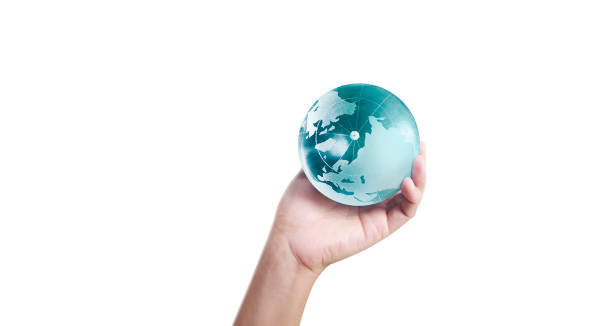 istock Globe ,earth in human hand, holding our planet glowing 1209907920