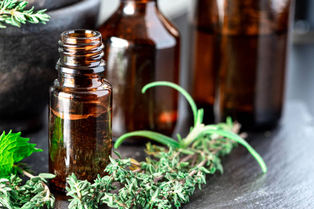 istock Essential oils in a brown glass bottle 1209908533