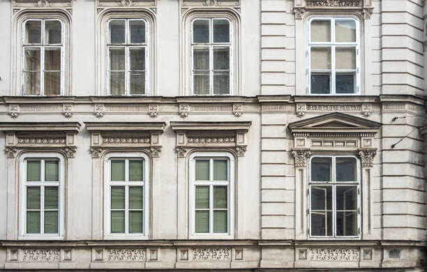 istock Facade of a building with a symmetrical pattern of windows 1209910119