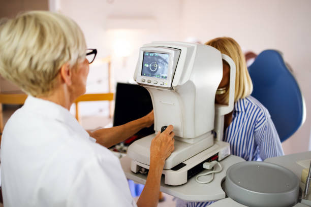 istock Ophthalmology eyesight diagnostic concept. Modern eye test machine equipment in clinic 1209910282