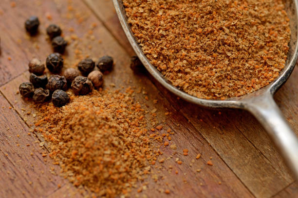 istock Herbal pepper. Grains of black pepper. 1209911015