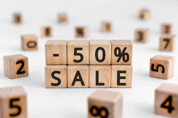 istock -50% sale - from wooden blocks with digits 1209912671
