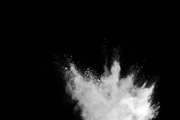 istock Freeze motion of white color powder exploding on dark background. 1209912833
