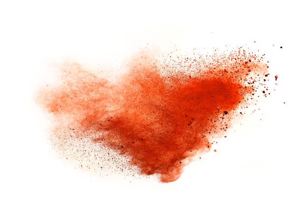 abstract orange powder explosion isolated on white background. - opening ceremony flash imagens e fotografias de stock