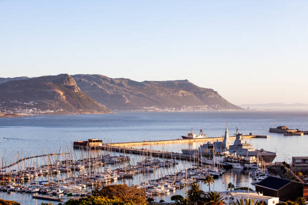 istock Navy warship and yachts in Simonstown harbour, Cape Town 1209912970