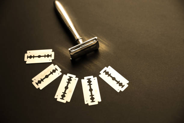 istock Razor and blade on the table. Stylish men set. Idea for a gift. Barber shop things. 1209913192