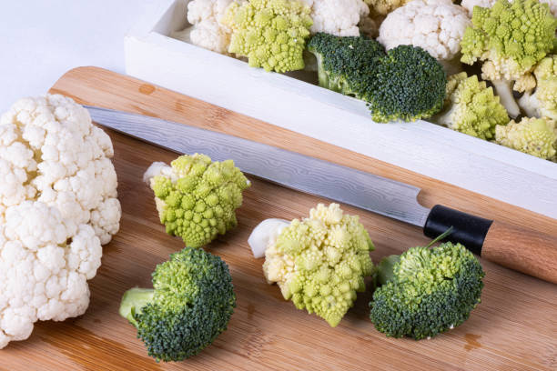 istock broccoli ready for cooking and cauliflower on a table 1209913730