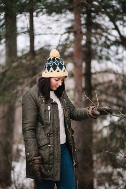 istock Young girl with hat relaxing in winter mountain 1209916962
