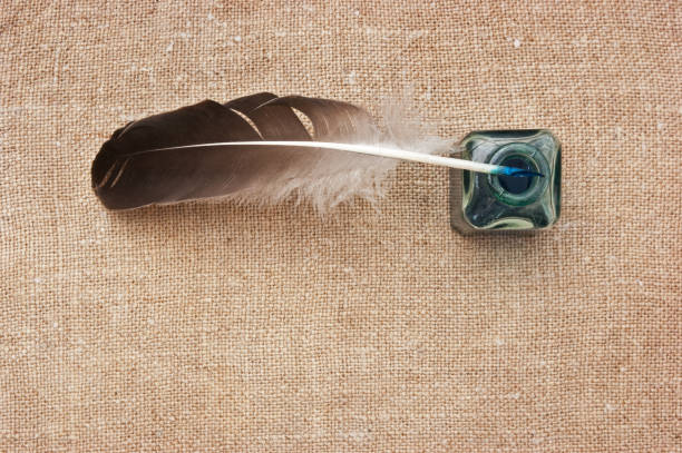 istock glass inkwell with a quill pen 1209918443