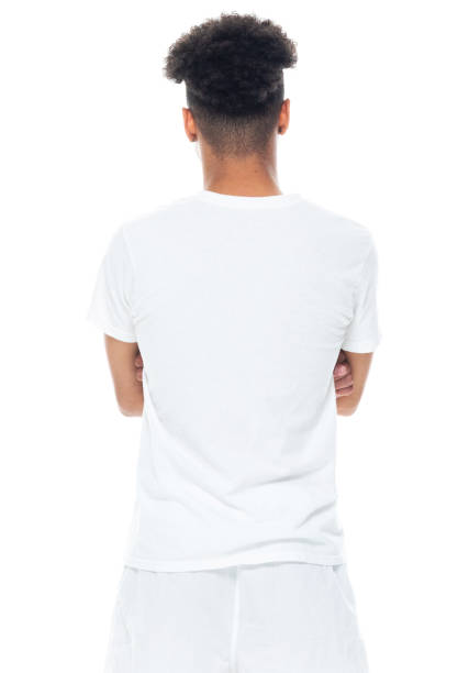 афро-американских этнических подростков, стоящих перед белым фоном носить футболку - underwear men t shirt white стоковые фото и изображения