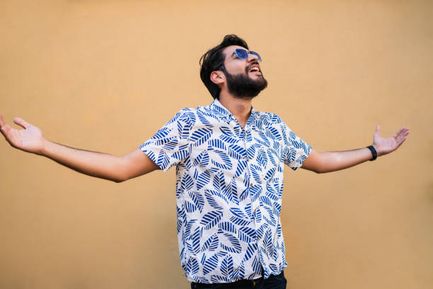 istock Man enjoying summer and wearing summer clothes. 1209922003