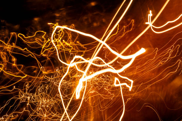 Abstract Light painting with candle light - blurred lights background