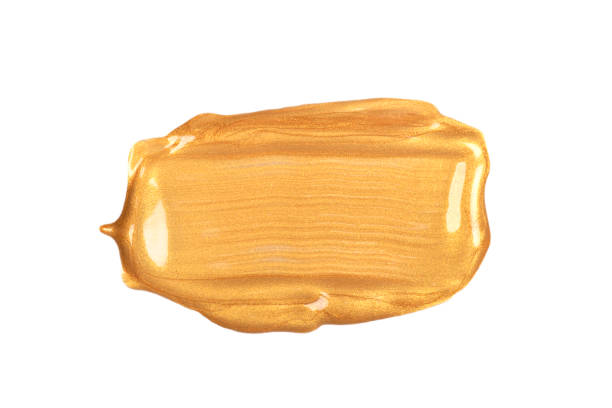 istock Rectangular golden brush stroke or smear cut out on white background. Top view. 1209926226