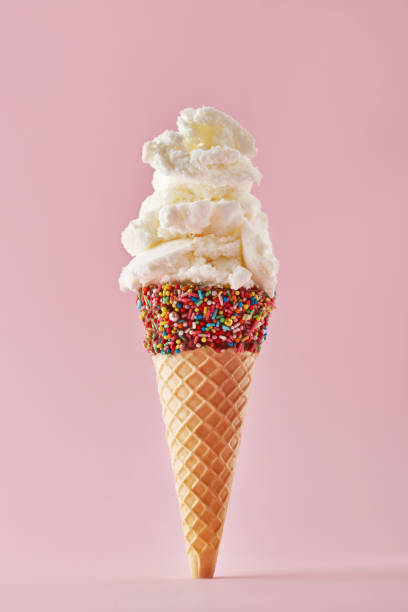istock Ice cream cone isolated on a pink background. Copy space 1209927854
