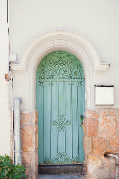 istock The vintage blue door with decorative elements 1209929174