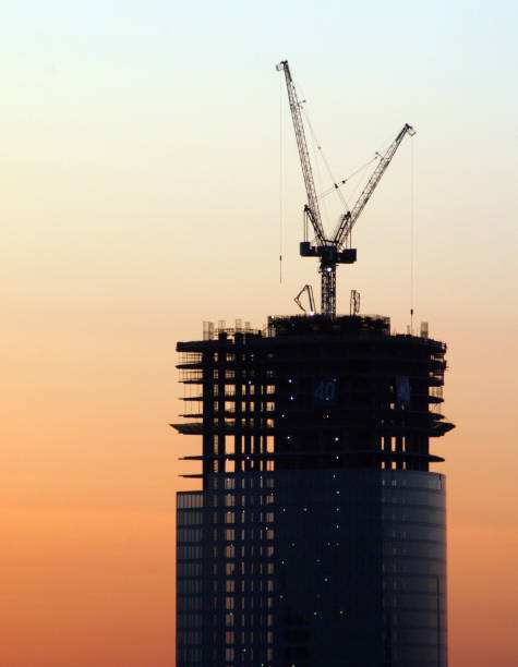 istock skyscraper under construction on the background of the morning sky 1209930300