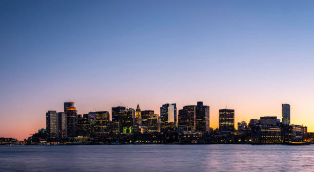 istock Panoramic Night Cityscape Boston Skyline over Mystic River in Boston 1209931664