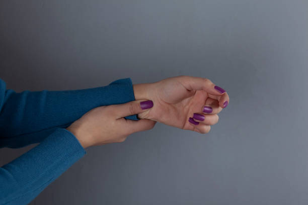 istock woman finger in pulse 1209932172