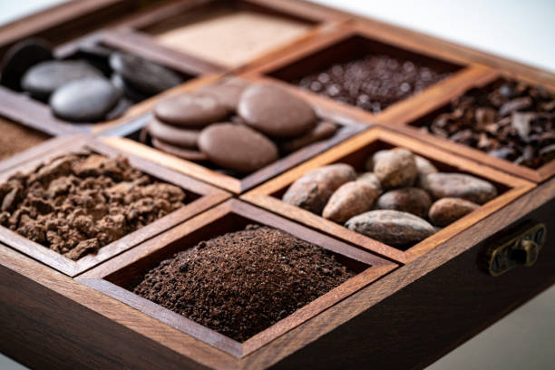 istock Chocolate wood box with coca beans chocolate drops cacao powder 1209942153