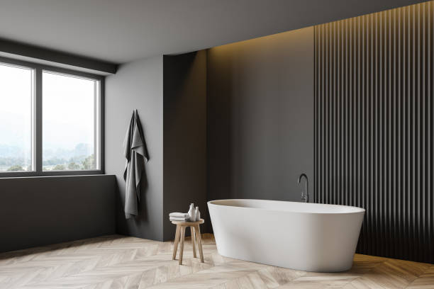 istock Gray loft bathroom corner with tub 1209944940