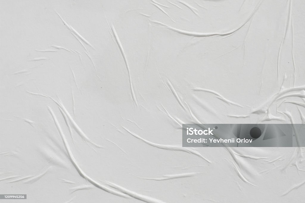 Crumpled white paper. Abstract background for the designer. Textured Stock Photo