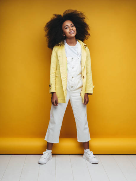 istock Young woman wearing raincoat 1209950881