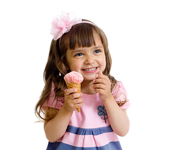 little girl with ice cream in studio isolated