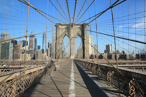 Brooklyn bridge on a sunny morning in may 2019 in New York city over East river