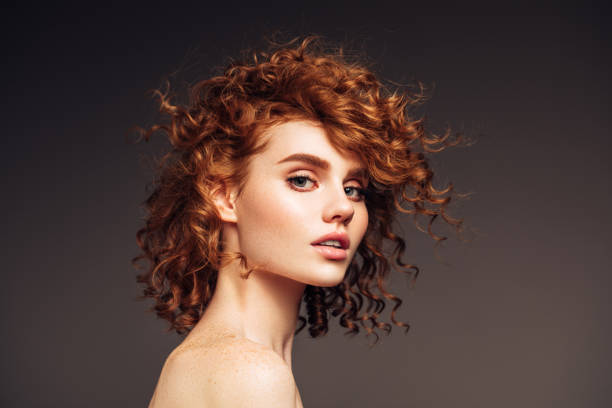 istock Beautiful redhead woman 1209955289