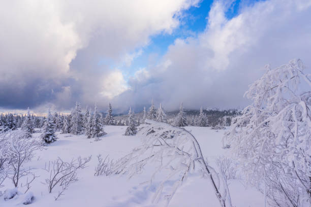 istock Clouds in the setting sunlight on mountain hills. Tatry. 1209955999