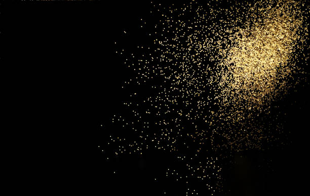 istock Black background with golden sparkles. Blurred  effect. Concept for festive background 1209956018