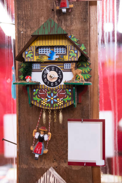 Whimsical Cuckoo Clock Hanging a Book Store stock photo