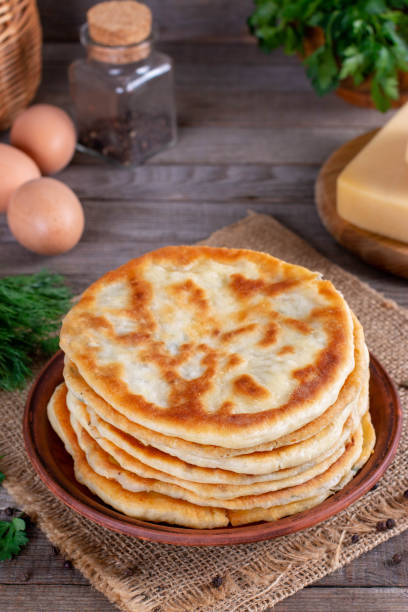 istock Khychiny - traditional caucasian flatbread filled with cheese and herbs 1209956832