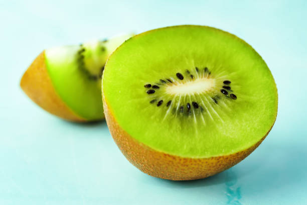 istock Ripe kiwi fruit with slices 1209956930