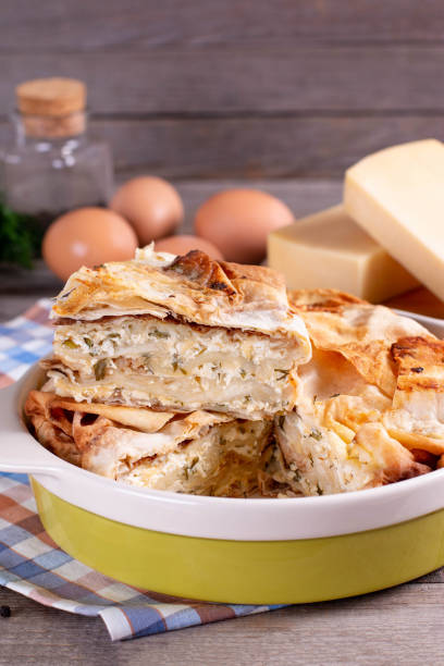 istock Spanakopita, greek phyllo pastry pie with cheese filling 1209957016